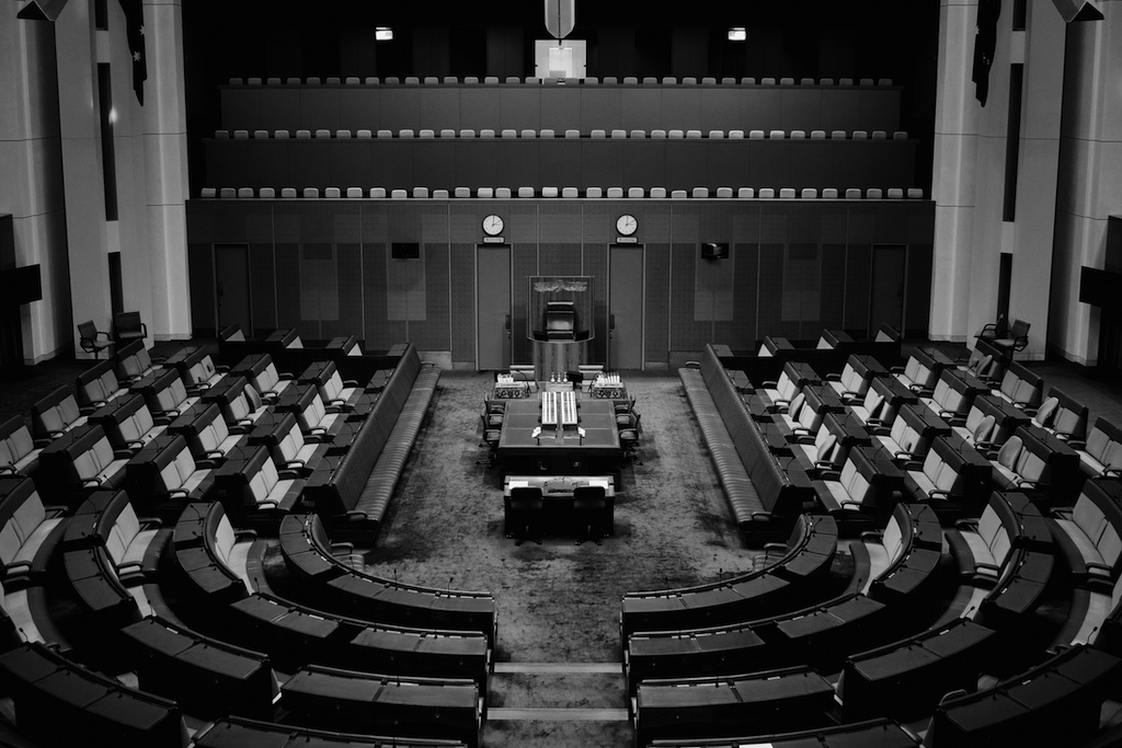a b&w picture of an empty court room