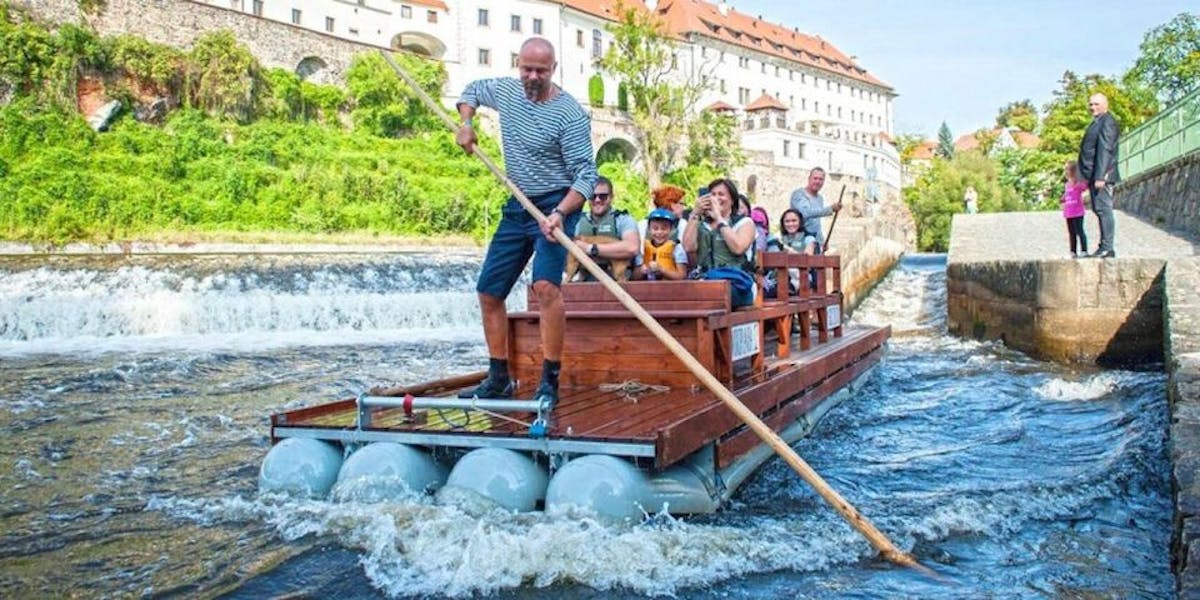 a wooden raft river cruise on the Vltava River in Cesky Krumlov