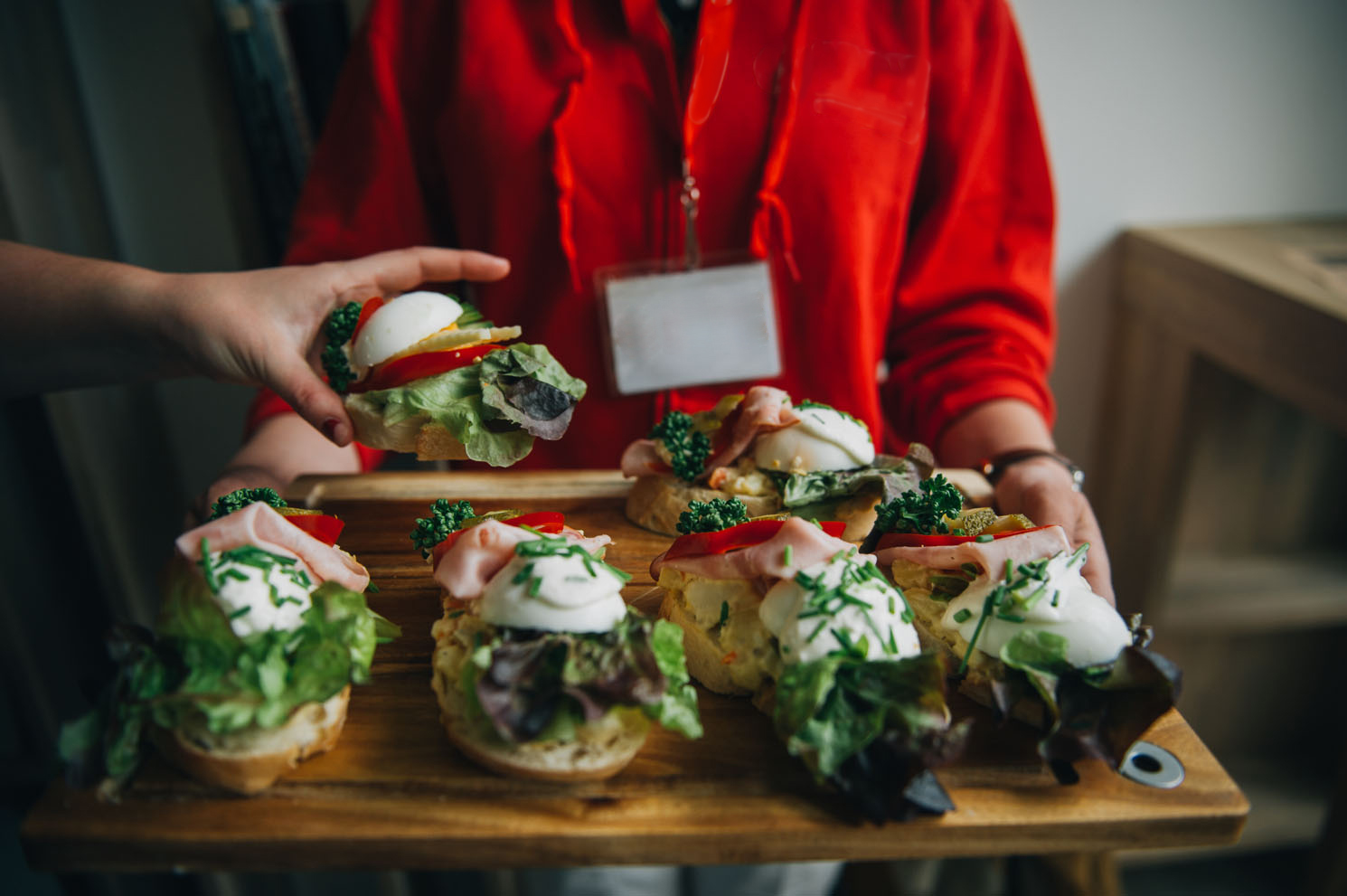 a person sitting at a table with food