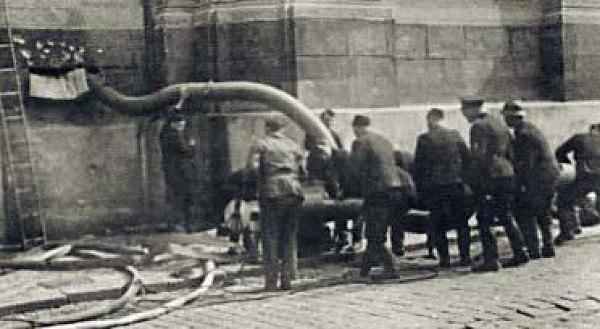 a group of people standing in front of a building