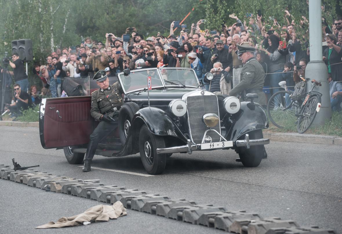 a group of people riding on the back of a truck