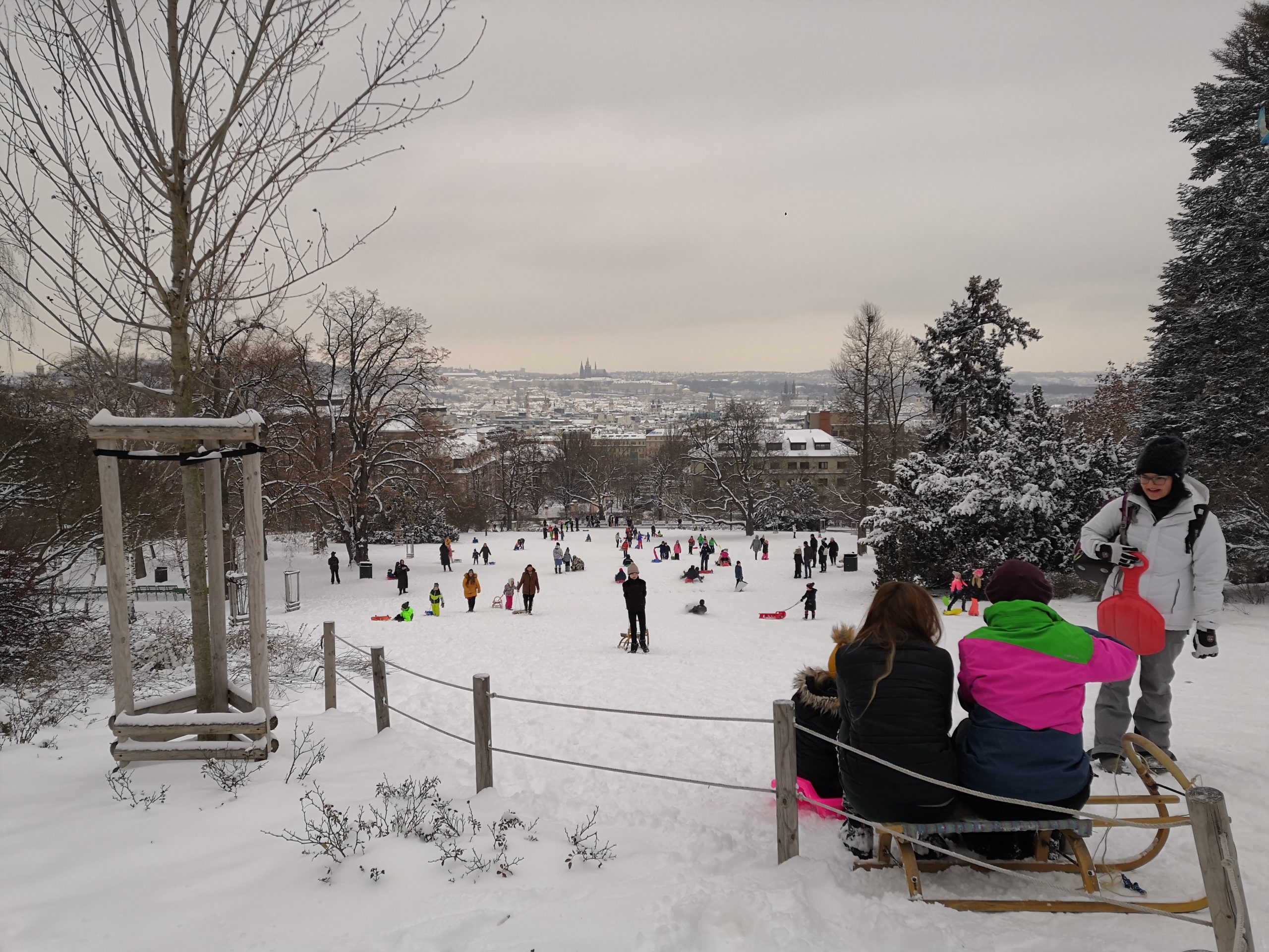 a group of people that are standing in the snow