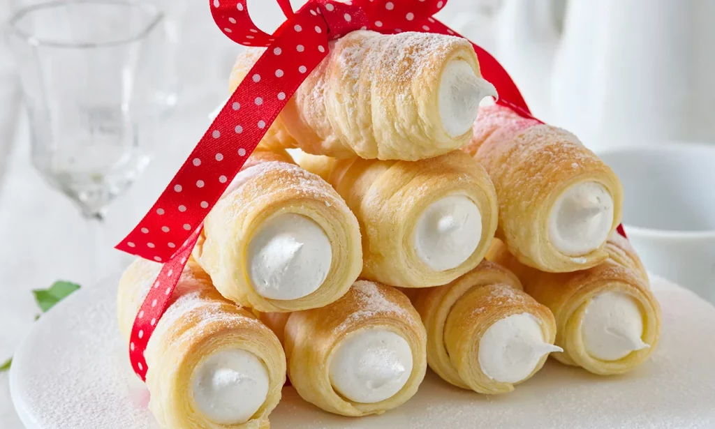 typical Czech confection called kremrole - a t tube of puff pastry filled with whipped cream
