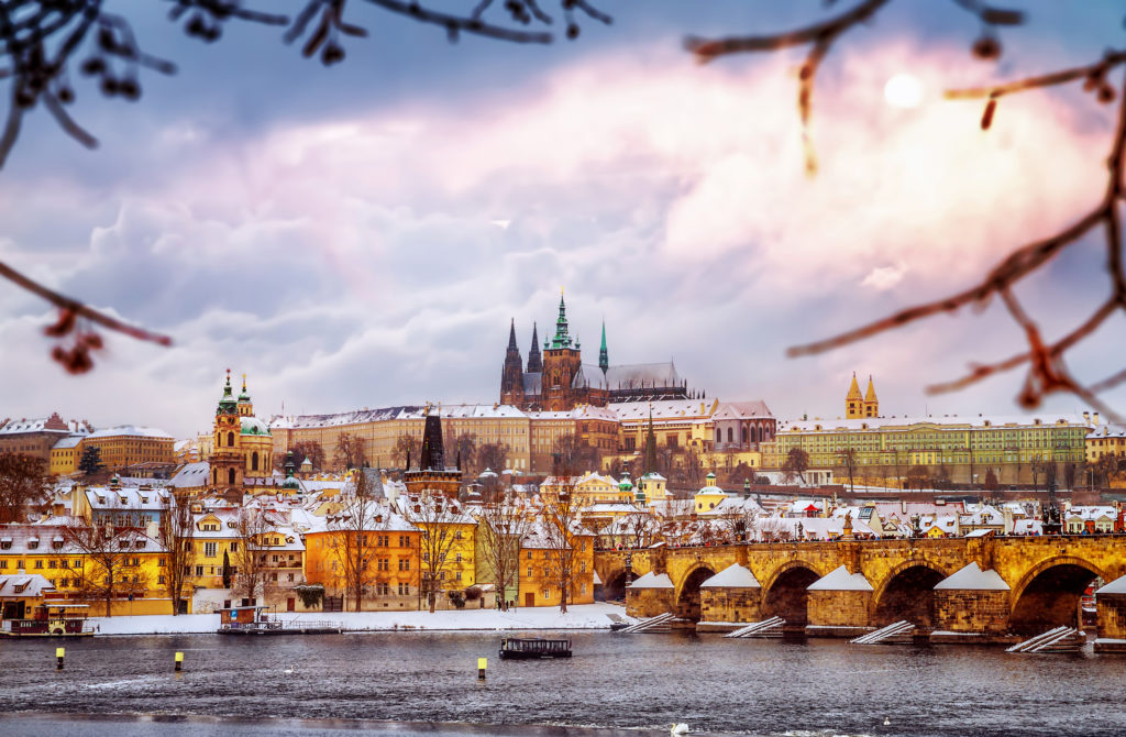 the view of Prague Castle and the Lesser Town of Prague covered by snow
