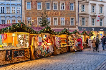 wooden stands with local souvenirs during the Christmas markets in Prague