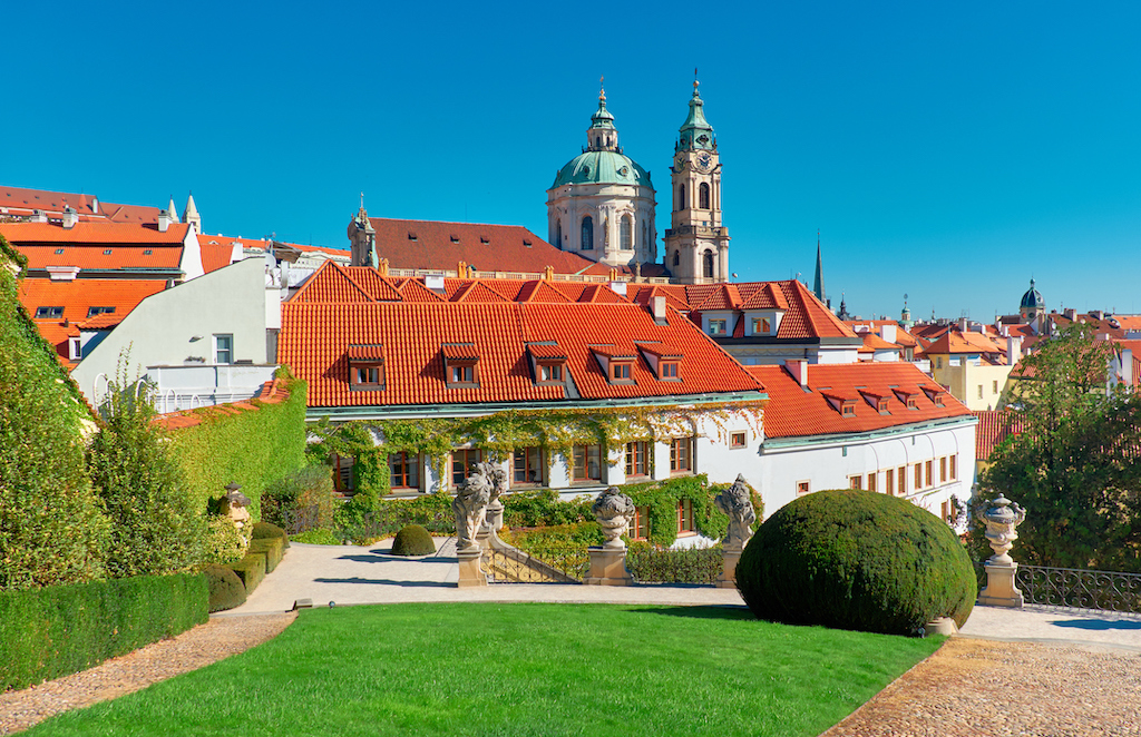 inside the Vrtba Garden in Prague with a view of St. Nicolas Church in the background