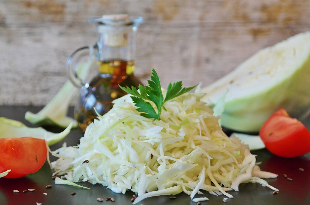 a close up of a plate of white fermented cabbage Czech-style