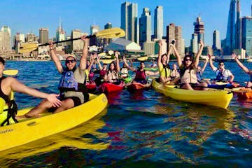 a private group of people kayaking in NYC