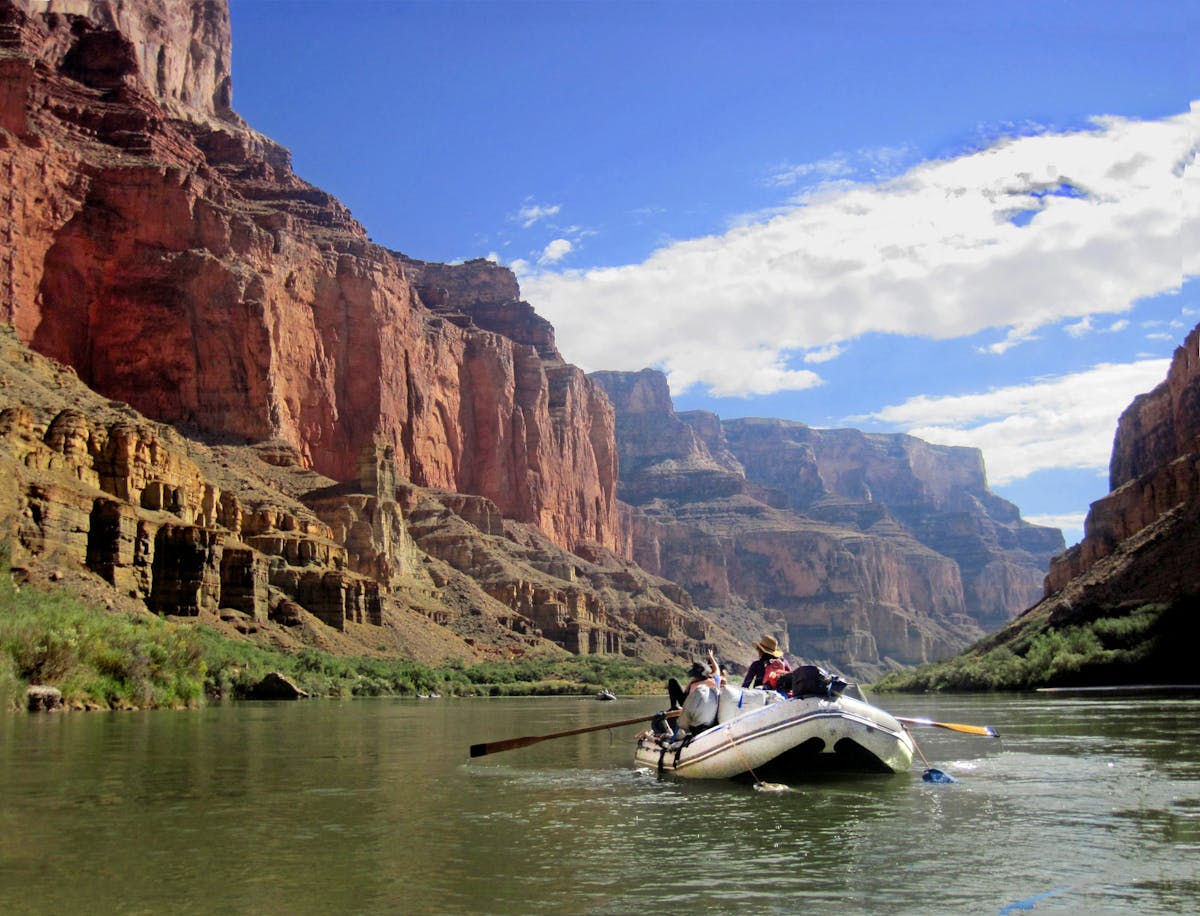 rafting kayak floating down the Grand Canyon river