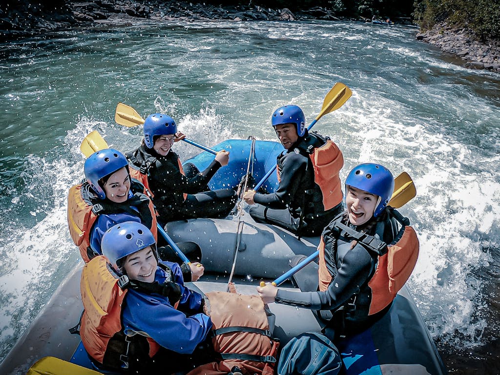 white water rafting guest smiling