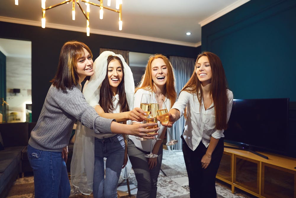 group of friends toasting with champagne