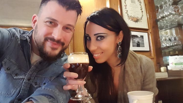 a couple drinking a glass of bicerin in Turin