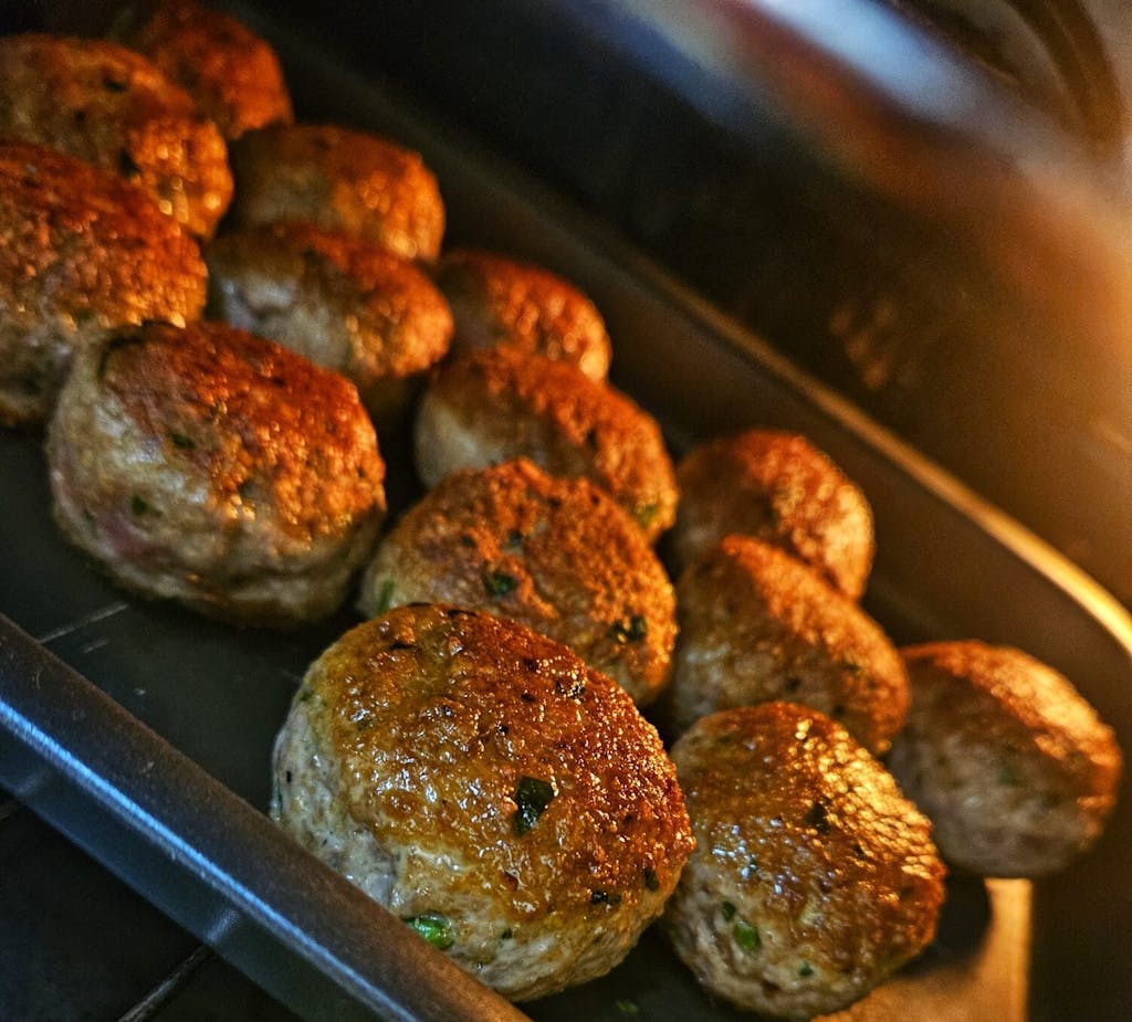 a close up of polpette on a stove