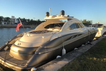 a boat that is sitting in a parking lot
