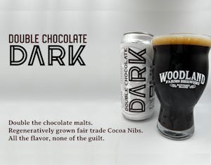 Woodland Dark N/A Stout in a can and a glass.