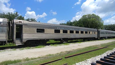 a large long train on a steel track