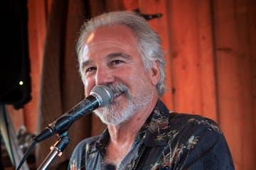 a man talking into a microphone
