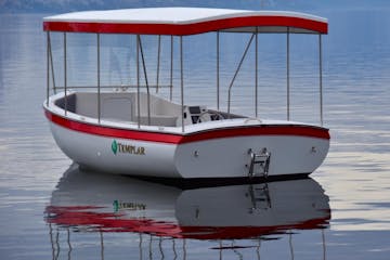 a small boat in a body of water