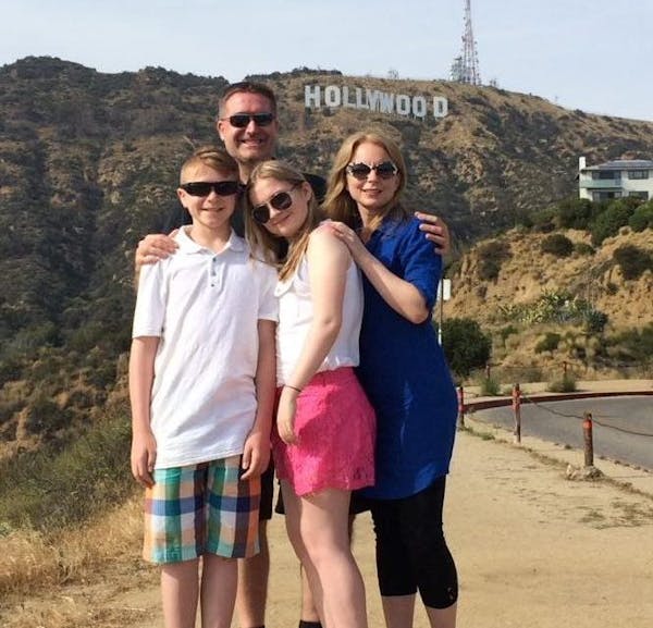 family infront of hollywood sign