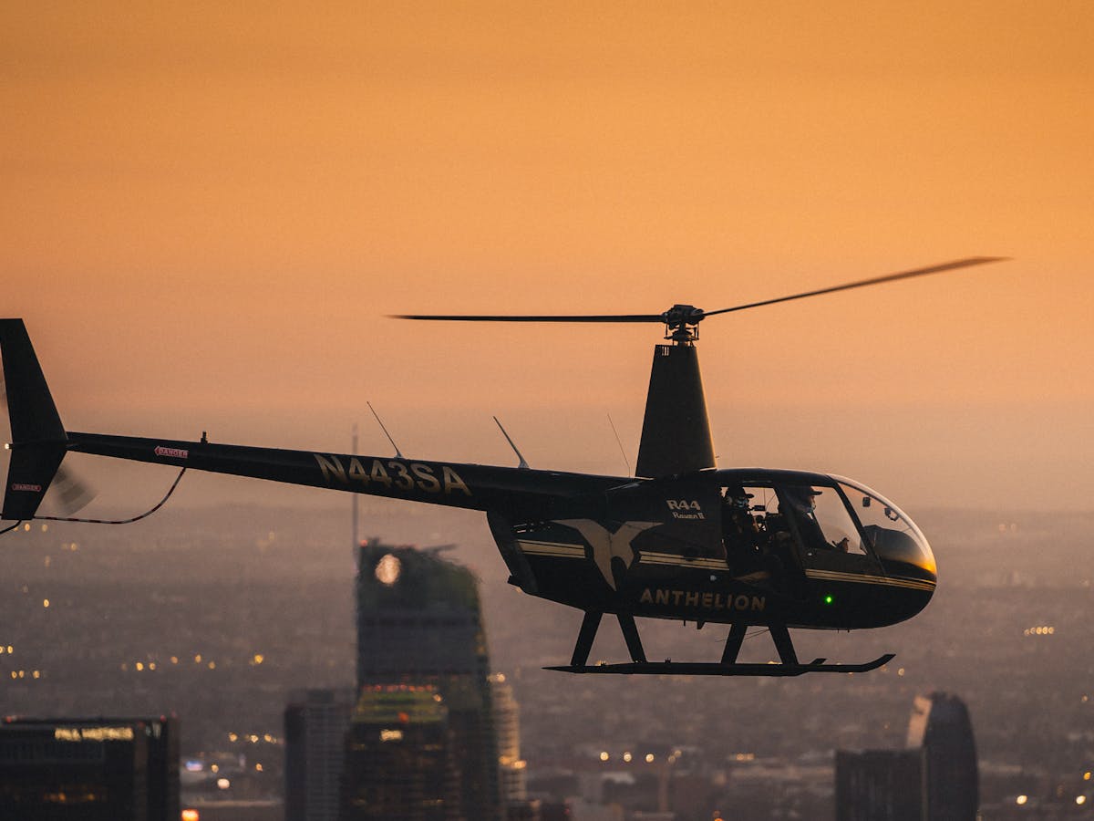 helicopter flying at dusk