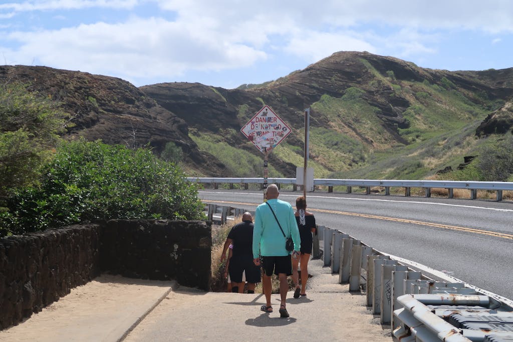 People on a road in Hawaii