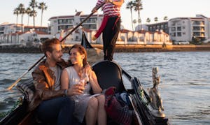 A couple celebrating Valentine's Day at The Gondola Company on a gondola ride in San Diego