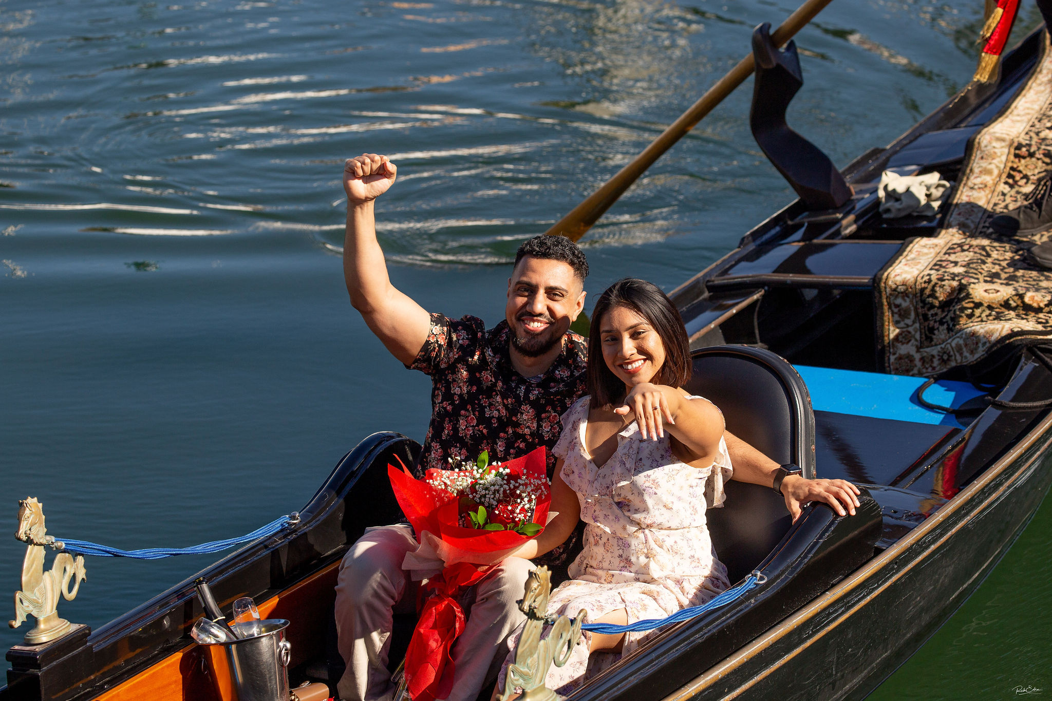 A newly engaged couple on at The Gondola Company in San Diego