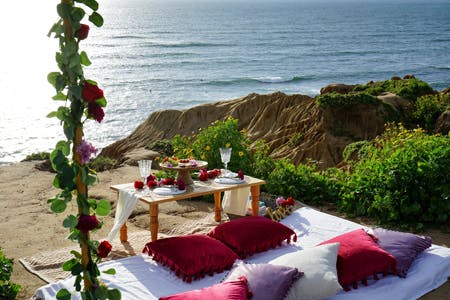 A romantic picnic set up for a proposal at Sunset Cliffs
