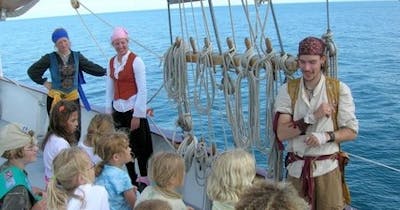 Participants and guides on an educational sailing tour in Chicago