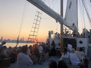 Michael Charles and his Band playing on board Tall Ship Windy's Monday Night Blues Sail at sunset