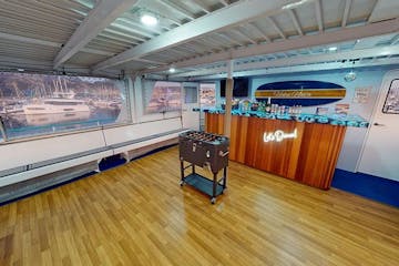 Bar and dance floor on observation deck of Hoku Nai'a Whale Watching Power Catamaran off the coast of Dana Point, CA
