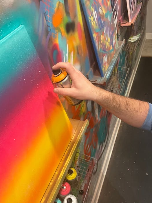 Spray Paint and Sip Experience