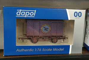 close up of purple model railway wagon