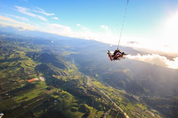 Aerial view of tandem skydiving in New Zealand