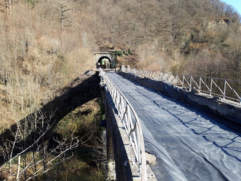 a train traveling over a bridge