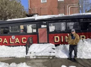 a bus that is covered in snow