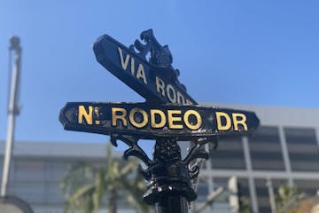 a close up of a street sign on a pole