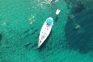 Drone photograph of our sailing boats in Kalogries, West Milos