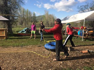 River guides practicing throw ropes for rescue