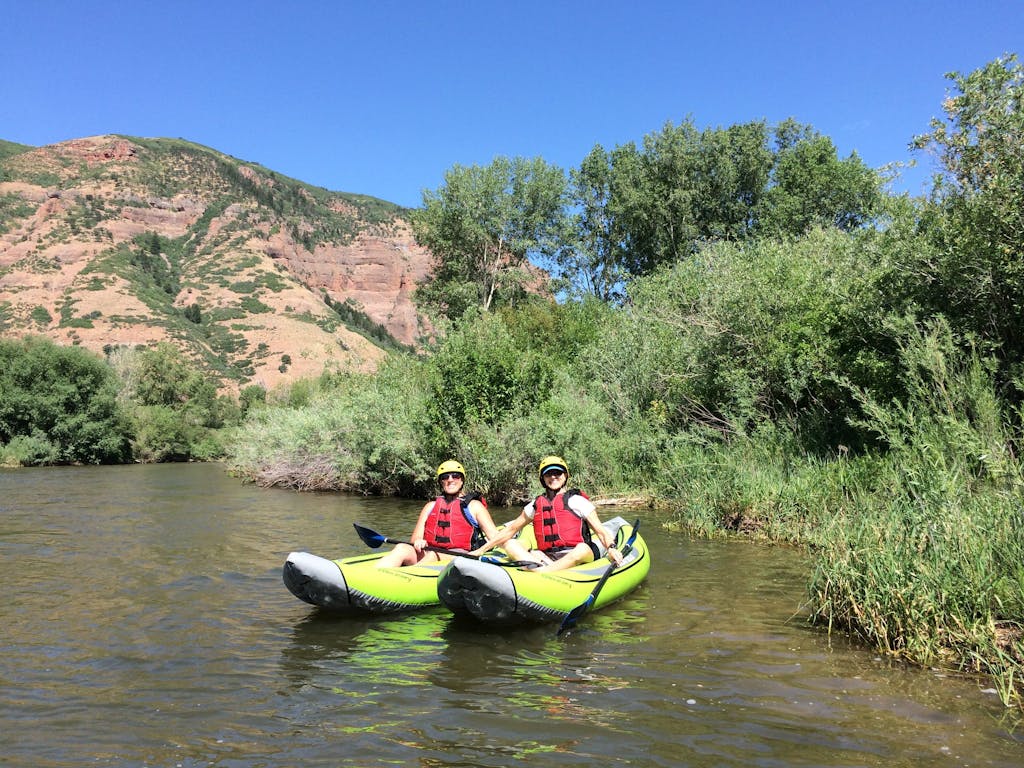Paddling inflatable kayaks on the Weber River