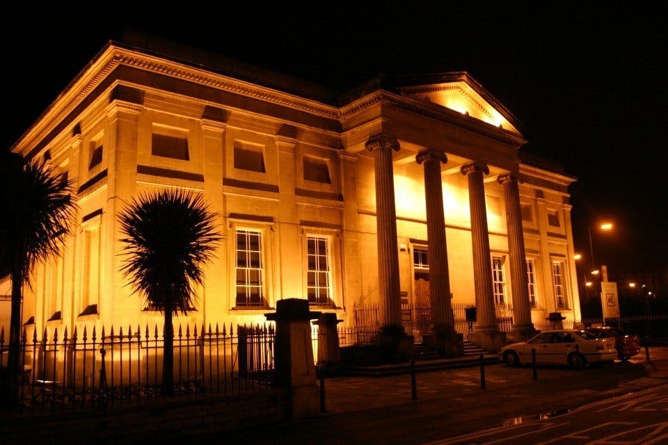 Swansea Museum lit up at night