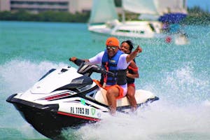 a man riding a jet ski in the water
