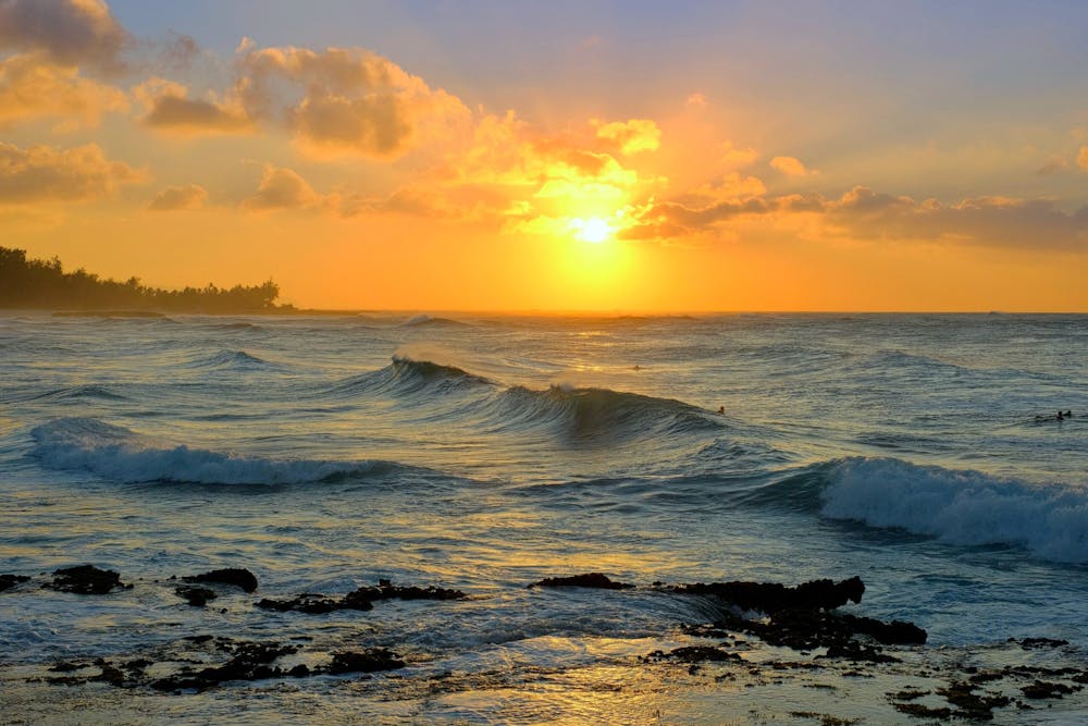 a-sunset-over-a-body-of-water-turtle-bay