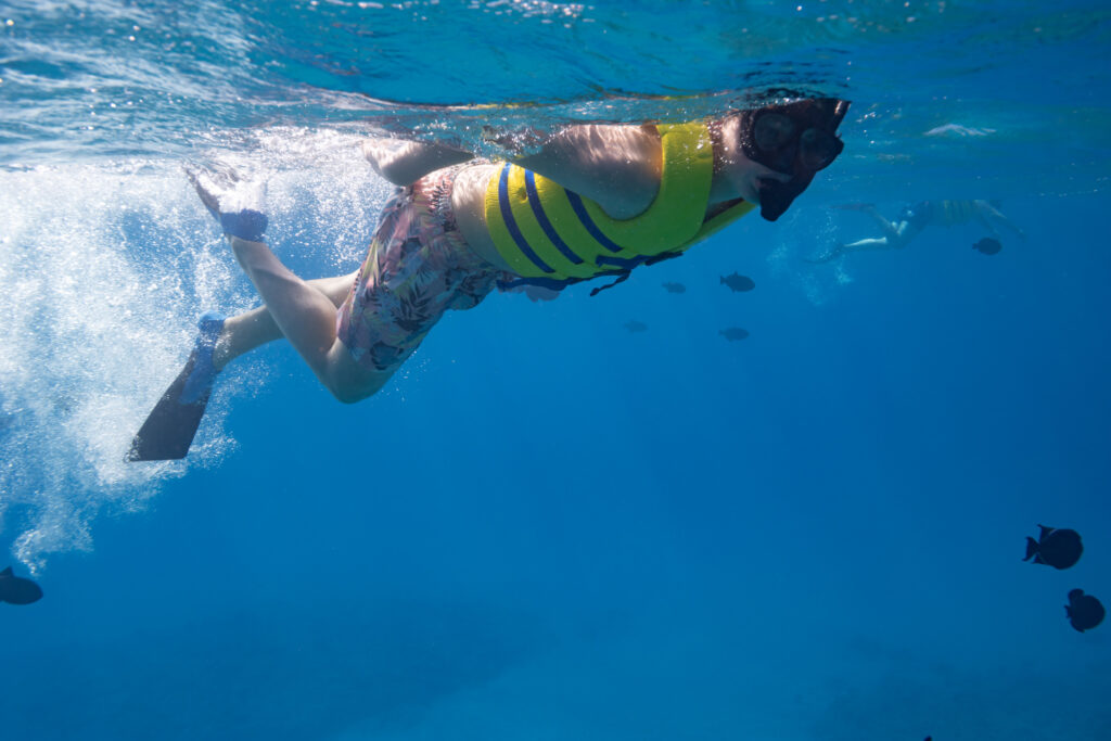 a person snorkeling in the ocean