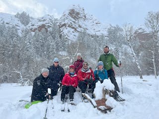 a group of people snowshoeing in Morgan Utah