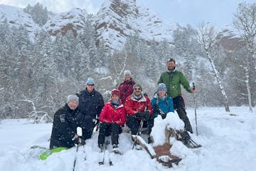 a group of people snowshoeing in Morgan Utah