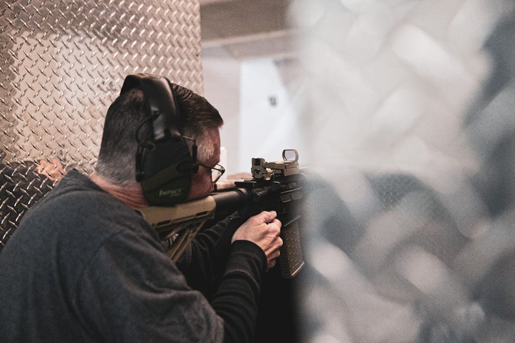 Man enjoys his first time at a shooting range