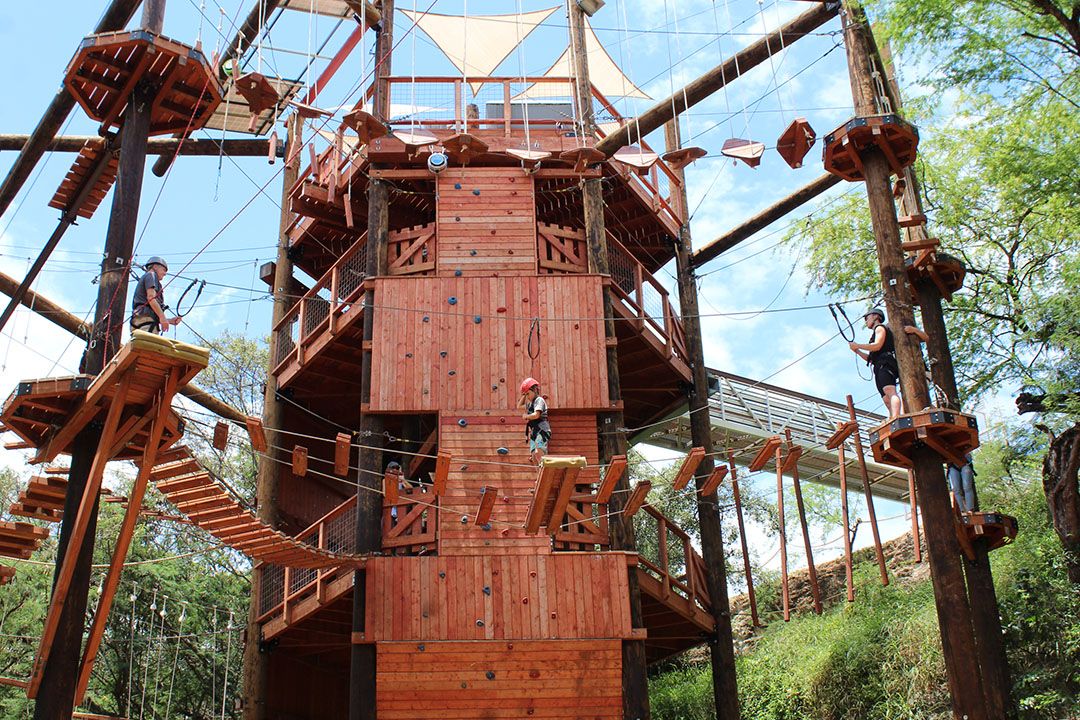 People climbing the Adventure tower 