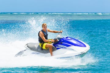 Young Man on Jet Ski in the waters