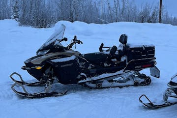 a snowmobile on some snow